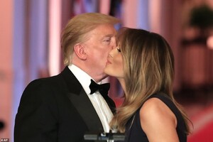 13555648-7034959-The_president_planted_a_kiss_on_his_wife_s_cheek_during_the_even-a-26_1557977917871.jpg