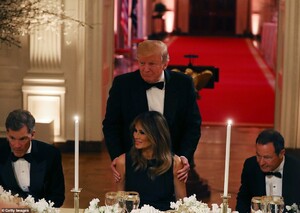 13555672-7034959-The_president_taps_his_wife_s_sh-a-29_1557977917881.jpg