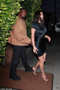 13894708-7065853-Remember_when_Kim_pulled_focus_at_the_Met_Gala_in_a_custom_Thier-a-2_1558682143739.jpg