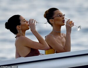 13957982-7070717-Bottoms_up_The_women_knocked_back_their_drinks_as_the_bobbed_alo-m-194_1558820745326.jpg