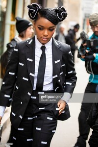 janelle-monae-wearing-a-black-printed-suit-black-tie-and-white-shirt-picture-id1133454224.jpg