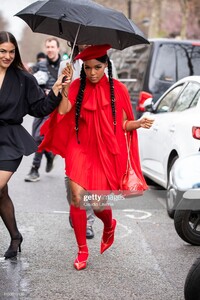 janelle-monae-wearing-a-red-mini-dress-red-heels-with-red-socks-red-picture-id1133519139.jpg