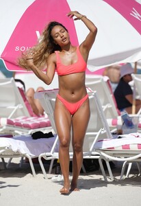 karrueche-tran-in-a-neon-pink-bikini-on-the-beach-in-miami-05-11-2019-5.jpg