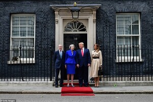 14348424-7102755-Warm_welcome_President_and_Mrs_Trump_were_greeted_outside_Downin-a-15_1559665764581.jpg