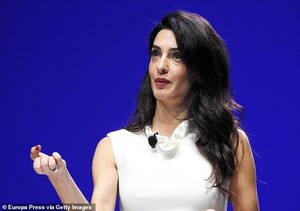 14395530-7107125-Passing_on_wisdom_Amal_Clooney_discusses_how_technology_companie-a-12_1559731296056.jpg