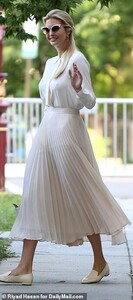 14646588-7128353-Off_to_work_Ivanka_also_donned_a_pair_of_funky_sunglasses_that_h-m-67_1560262934073.jpg