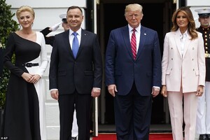 14705942-7134179-President_Donald_Trump_and_first_lady_Melania_Trump_greet_Polish-a-56_1560379545830.jpg