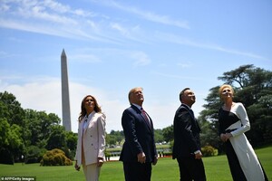 14707710-7134179-The_Trumps_and_the_Dudas_watch_F_35s_fly_over_the_White_House-a-43_1560379545526.jpg