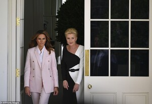 14708708-7134179-Melania_Trump_and_Agata_Kornhauser_Duda_walk_through_the_Colonna-a-49_1560379545685.jpg