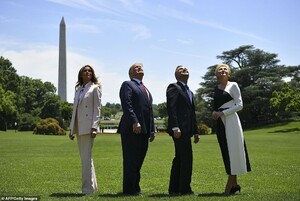 14710012-7134179-The_Trumps_and_Duda_s_stood_on_the_South_Lawn_of_the_White_House-a-55_1560379545826.jpg