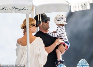 14821230-7144461-Grin_The_Fast_and_Furious_star_grins_at_his_son_as_the_family_ge-a-4_1560596424916.thumb.jpg.c12be6c961476347a8ec29dd2fe46274.jpg