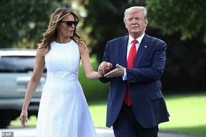 14956830-7156509-Protection_She_shielded_her_eyes_behind_a_pair_of_sunglasses-a-41_1560907594835.jpg