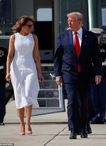 14957938-7156509-Melania_continued_to_smile_at_her_husband_as_they_switched_plane-a-47_1560907595582.jpg