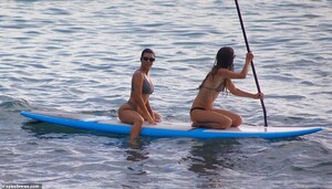 15059958-7165251-Mover_and_shaker_Kourtney_had_some_time_to_relax_on_the_paddle_b-a-14_1561077889365.jpg