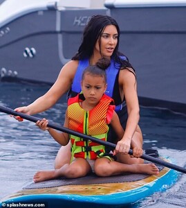 15128352-7170767-Safety_first_North_opted_for_a_colorful_life_jacket_for_safety-a-125_1561241000652.jpg