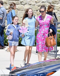 15157194-7172699-Family_time_She_left_church_alongside_her_two_daughters_Seraphin-m-1_1561327244545.jpg