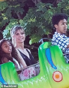 15215066-7178137-Rides_Heidi_rides_on_a_rollercoaster_with_Henry_and_Lou-a-8_1561470859368.jpg