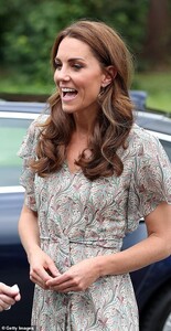 15230768-7179017-Kate_pictured_in_her_stunning_paisley_frock_which_features_a_bel-a-89_1561471319018.jpg