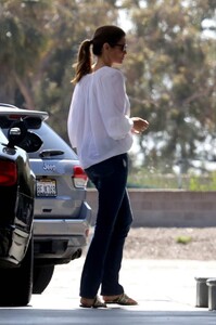 cindy-crawford-spotted-in-a-white-blouse-and-blue-jeans-as-she-stops-by-at-a-gas-station-to-fill-up-her-car-in-malibu-california-280519_3.jpg