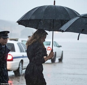 15775720-7224841-Getting_drenched_This_comes_after_Melania_left_the_White_House_o-a-192_1562629964751.jpg