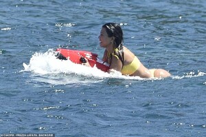 16558182-7291513-Smooth_sailing_She_had_a_bit_of_fun_as_she_hopped_into_the_water-m-38_1564190673892.jpg