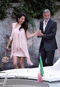 16645630-7298671-A_list_couple_Amal_and_George_were_every_inch_the_A_list_couple_-a-15_1564443052794.jpg