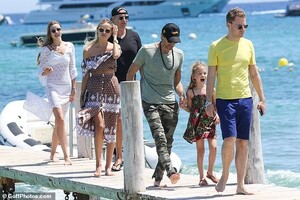 16722852-7306075-Out_and_about_The_group_were_seen_boarding_a_nearby_speedboat_be-a-9_1564585401659.jpg