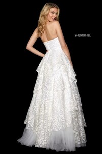 Sherri-Hill-53209-ivory-44853.jpg-600.thumb.jpg.50b36a788239b4fd37ba3ebe95f68de9.jpg