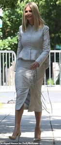 16502524-7286529-Say_cheese_She_looked_fresh_faced_and_even_smiled_for_the_camera-a-40_1564080292040.jpg