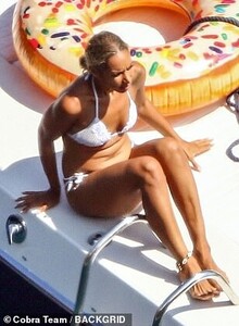 16771874-7310723-Lady_of_Leisure_Leona_was_relaxing_on_the_deck_of_the_boat-m-175_1564669899448.jpg