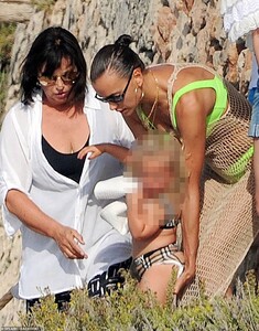 17013954-7334629-Helping_hand_Irina_s_mother_helped_her_to_look_after_her_daughte-m-127_1565210138153.jpg