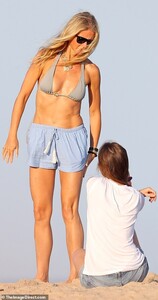 17055262-7338039-Their_other_halves_Paltrow_and_Martin_were_joined_by_Brad_Falchu-m-76_1565282033949.jpg