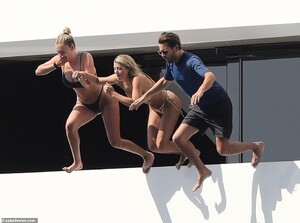17059366-7337675-Daring_The_trio_were_feeling_particularly_daring_as_they_jumped_-m-232_1565288532273.jpg