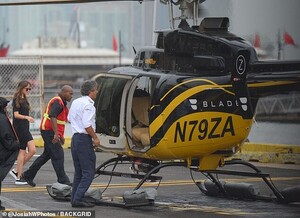 17077800-7339725-Better_than_driving_Dakota_Johnson_was_spotted_hopping_on_a_heli-m-156_1565322466428.jpg