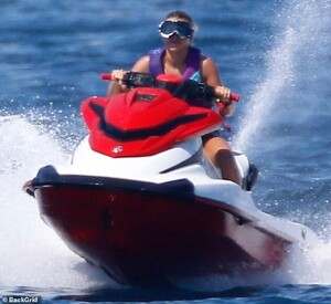 17300310-7358997-What_an_ensemble_Also_on_the_boat_with_them_was_Kylie_s_28_year_-a-6_1565862761894.jpg