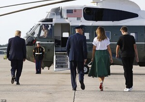 17426854-7369959-At_one_point_Trump_walked_ahead_of_his_wife_and_their_teenage_so-a-16_1566203132977.jpg