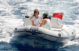17490218-7375337-Giving_Bond_a_run_for_his_money_The_couple_looked_picture_perfec-a-5_1566324852234.jpg