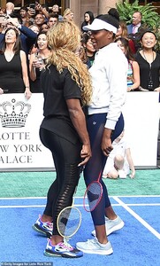 17593276-7385905-Sisters_forever_Serena_Williams_and_Venus_Williams_were_having_a-a-3_1566528668027.jpg