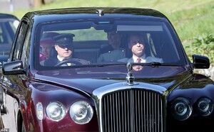 17668006-7392541-Prince_William_37_sat_in_the_passenger_side_in_a_blue_suit_and_b-a-11_1566736502374.jpg