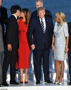 17685464-7393845-Scott_Morrison_watches_on_as_US_First_Lady_Melania_Trump_warmly_-a-16_1566783021115.jpg