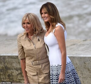 17702620-7394837-Brigitte_and_Melania_flashed_wide_smiles_as_they_posed_for_photo-m-24_1566822963833.jpg