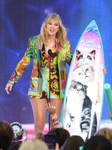 Taylor Swift accepts the Teen Choice Icon Award onstage during FOX's Teen Choice Awards 2019 on August 11, 2019 in Hermosa Beach, California. 4.jpg