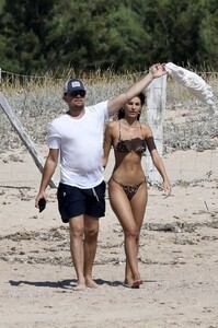 camila-morrone-rocks-leopard-print-bikini-while-enjoying-the-beach-and-jet-ski-ride-with-leonardo-dicaprio-in-corsica-france-0800819_3.thumb.jpg.fa7d168362384674c6692bbf4491fabe.jpg