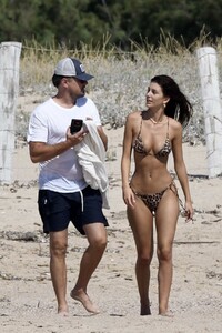 camila-morrone-rocks-leopard-print-bikini-while-enjoying-the-beach-and-jet-ski-ride-with-leonardo-dicaprio-in-corsica-france-0800819_7.thumb.jpg.578c112432a949819037f998cabc316d.jpg