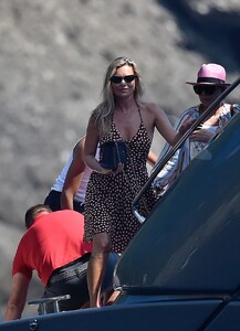 kate-moss-in-a-swimsuit-on-a-boat-near-portofino-08-09-2019-1.jpg