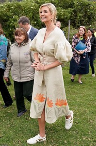 18068878-7431653-Say_cheese_The_first_daughter_grinned_happily_as_she_enjoyed_a_t-a-21_1567706038737.jpg