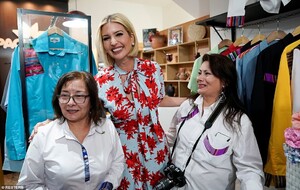 18109738-7431653-Loving_it_Ivanka_was_beaming_as_she_posed_for_photos_with_the_wo-a-59_1567699719384.jpg