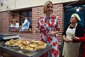 18114358-7431653-Looking_good_Ivanka_stood_in_front_of_two_large_plates_filled_wi-a-15_1567706038636.jpg