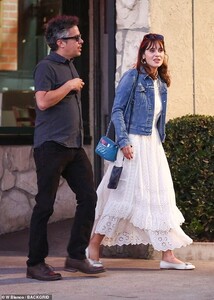 18427156-7459409-The_actress_39_wore_a_lovely_white_broderie_anglaise_maxi_dress_-m-111_1568351621157.jpg