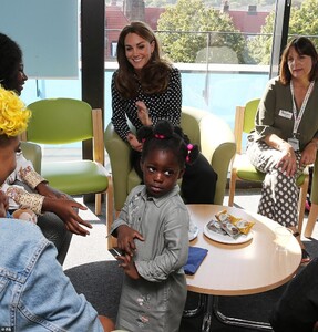 18668450-7481279-The_Duchess_of_Cambridge_looked_in_her_element_as_she_spent_time-a-142_1568895346941.jpg